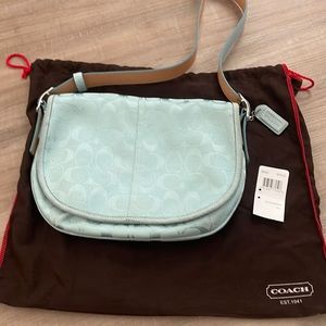 Coach signature canvas messenger bag.  Very good condition. Baby blue